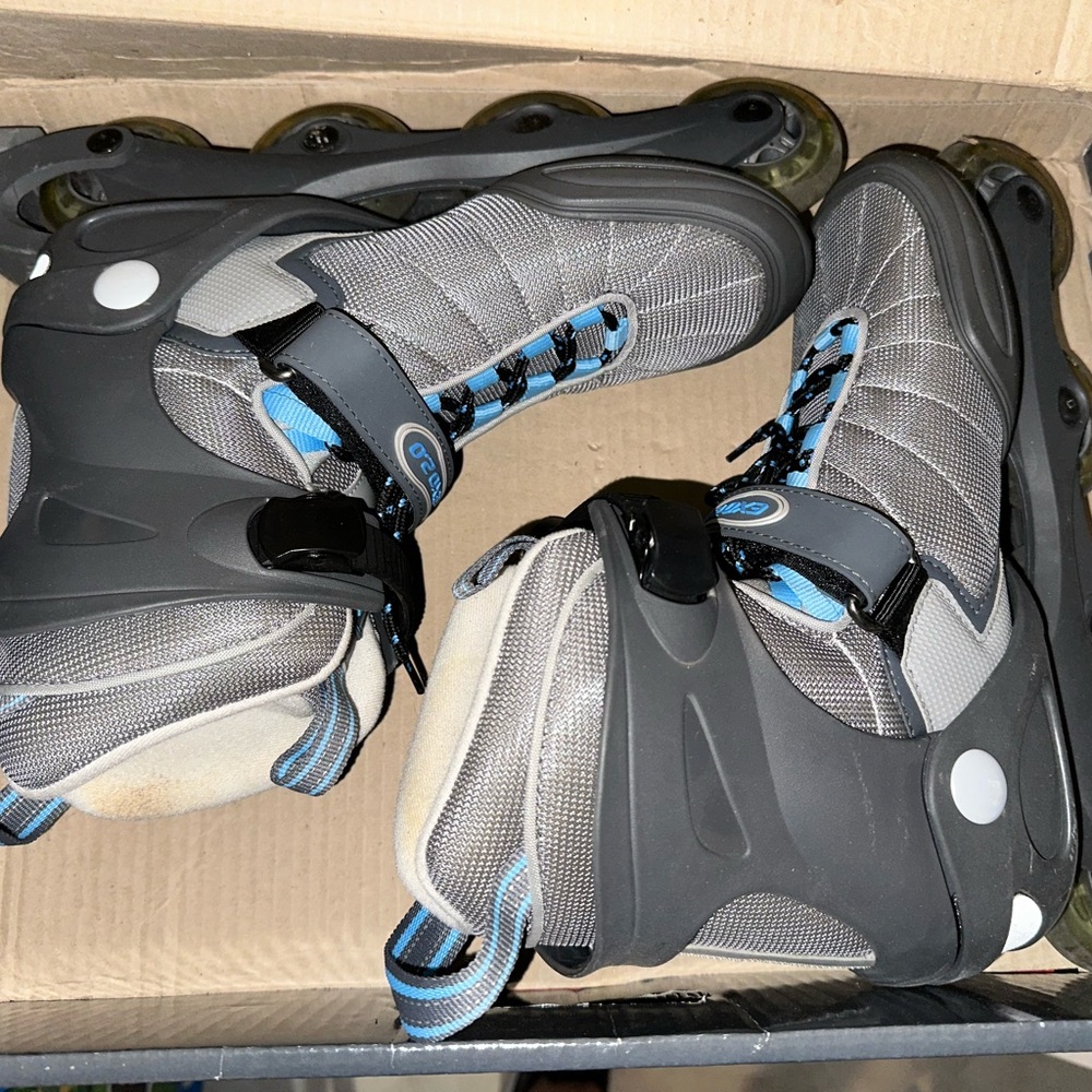 Gray and Black Rollerblades with Blue Accents